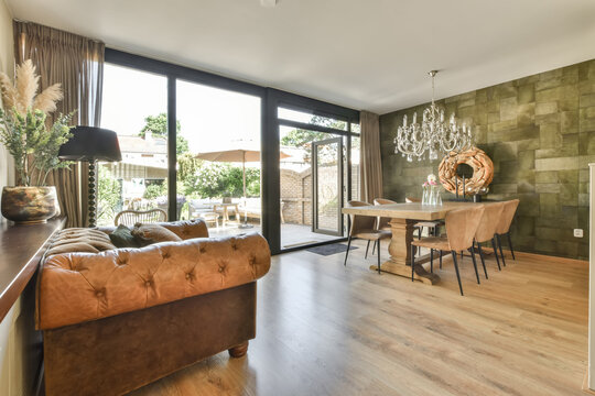 Modern Home With table and chairs next to dining room