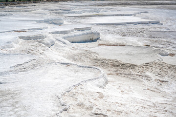 White travertines, calcite cliff of Pamukkale in Turkey