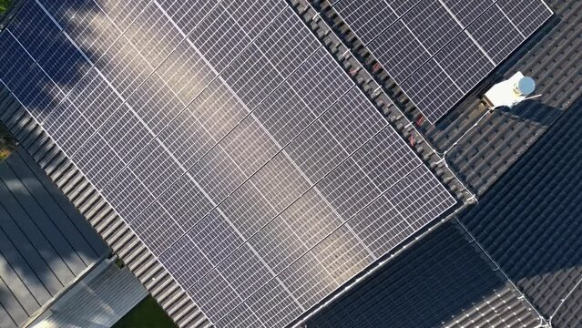 Photovoltaic panels on roof of eco house in nature.