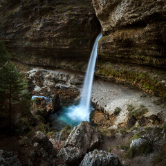 Fototapeta na wymiar Beautiful Mountain Waterfall in Alps - Upper Small Pericnik Cascade one of Travel Destinations in Gorenjska Region Slovenia