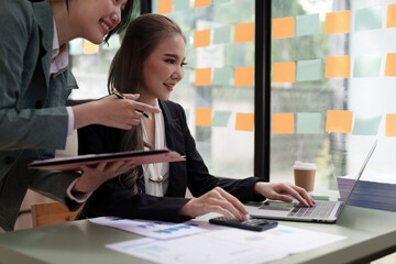 Group of business consultant working management big data and analyze financial document of company