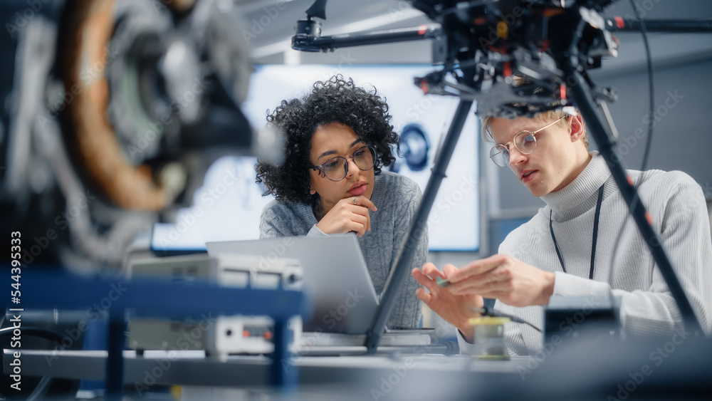 Poster Diverse Engineers Discussing New Powerful Microchip to Put it Inside the Modern Drone. Technological Startup and Innovative Technologies in Unmanned Aerial Vehicle Concept.