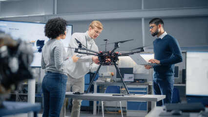 Diverse and Intelligent Science Specialists Looking at Prototype of the Drone and Talking About It...