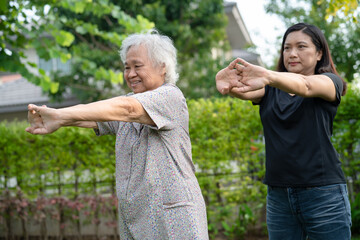 Asian senior or elderly old lady woman patient exercise with happy fresh enjoy in park, healthy strong medical concept