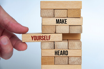 Make yourself heard text on wooden blocks. Motivational concept.