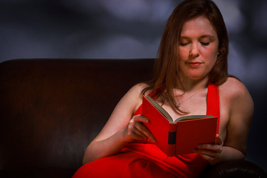 Young Woman Reading a Book