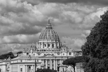 Fototapeta na wymiar The Papal Basilica of Saint Peter in the Vatican is the church of the Pope. It is in Rome, Italy. Designed principally by Bramante, Michelangelo, Maderno and Bernini