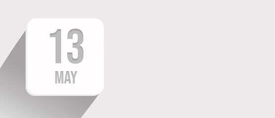 May 13rd. Day 13 of month, Calendar date. Calendar leaf icon on white with sunlight and long shadow, flat design.  Spring month, day of the year concept.