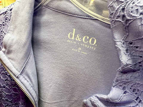 New Hope, Minnesota - November 6, 2022: Close up of a Denim and Company clothing label. This brand is sold on QVC