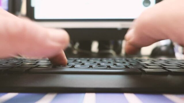 Business speed working fast concept, human hands close up typing on computer keyboard very fast time lapse person point of view