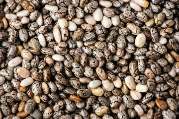 Chia seeds, texture background closeup.