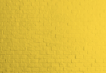 Textura de pared de ladrillos color amarillo. Fondo amarillo. Textura urbana. Fondo urbano...