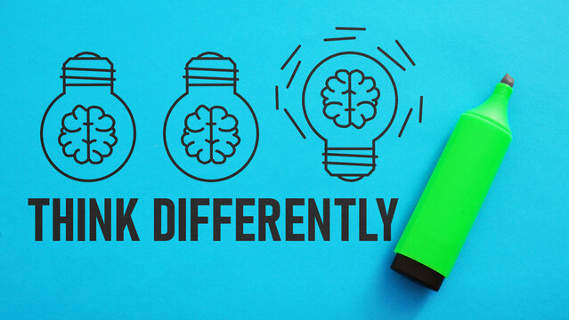 Think differently is shown using the textand pictures of lamps with brains