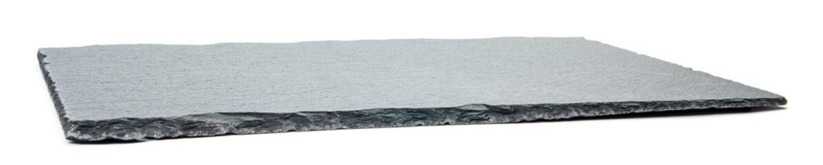 black slate serving board for serving cheese and snacks on a white background