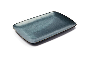 ceramic dark blue flat square plate with black blotches (dots, paint splashes, spots) close-up on white background