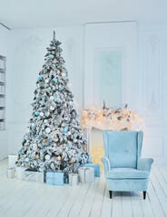 Room decorated for Christmas or new year. The interior of the room with a Christmas tree and decorations for the holiday.