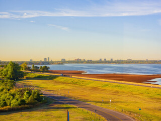 Aerial view of the landscape of Lake Hefner and cityscape