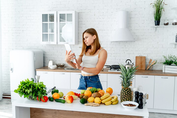 Healthy food prepairing in white kitchen. Delicious vegetables cooking.