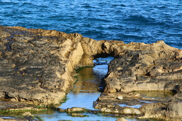 Rocks on the shores of the Mediterranean Sea in northern Israel.