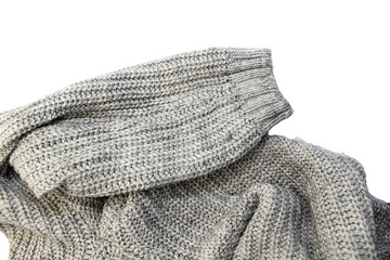 grey knitted sweater on isolated white background