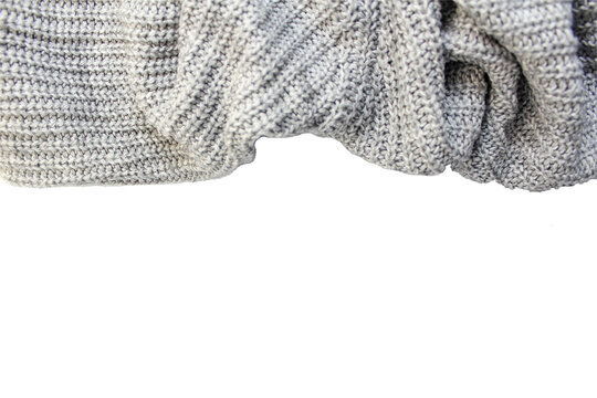 grey knitted sweater on isolated white background