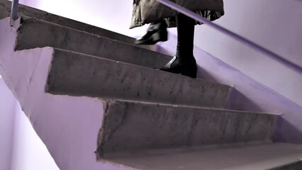 woman in long warm coat climbs stairs close-up of legs
benefits of walking
malfunctioning elevators in high-rise buildings
live camera in motion - Powered by Adobe