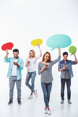 Naklejka premium Students with speech bubbles and gadgets