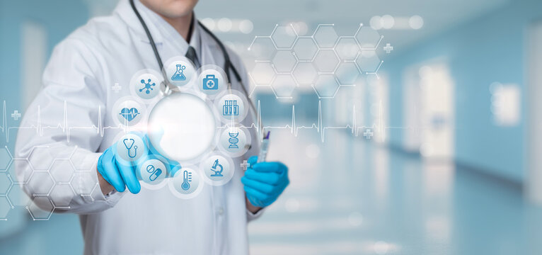 Doctor clicks medical icons . - Powered by Adobe