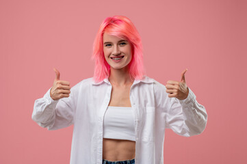 Girl with a happy smile demonstrating her strong approval of something