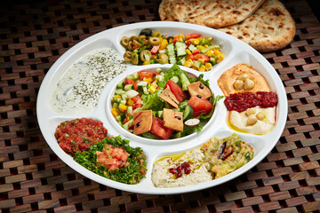 Marmaris Cold Mezza with Bread and salad served in dish isolated on table side view of middle east food