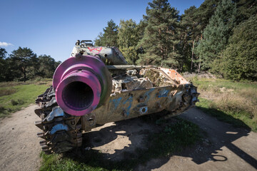 Fototapeta na wymiar Scrap battle tank on a military training area.
