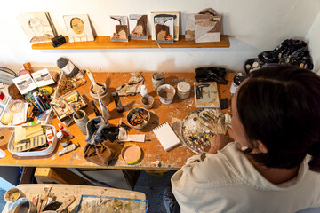 studio or work space of a hispanic woman artist, oil painting, mexico