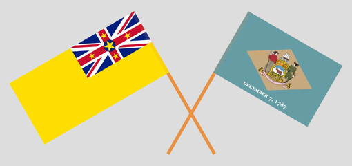 Crossed flags of Niue and The State of Delaware. Official colors. Correct proportion