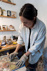 studio or work space of a hispanic woman artist, oil painting, mexico