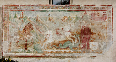 San Giorgio uccide il drago; affresco esterno della chiesa di San Giorgio a Zone (Brescia)