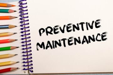 Preventive maintenance text concept write on notebook with pen