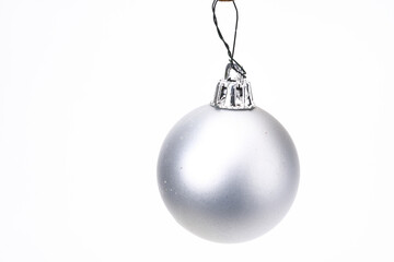 silver christmas ball on white