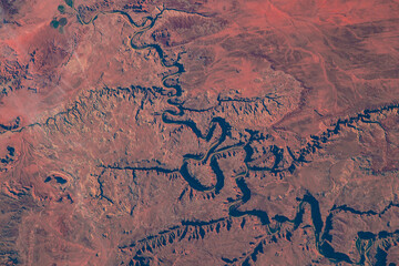 Aerial view of The Green River in Canyonlands National Park near Moab, Utah. Top view of river from satellite. Earth texture background. Earth landscape. Elements of this image furnished by NASA. © Mete Caner Arican