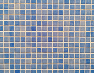 Fondo con detalle y textura de superficie de mosaico de ceramica en tonos azules