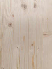 Fondo con detalle y textura de superficie de madera con vetas y nudos, en tonos claros © Iridium Creatives
