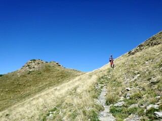 Fototapeta premium Vall the Boí, Pyrenees, Spain. A Hike over the ridge and summits around the valley of Boí during autumn. 