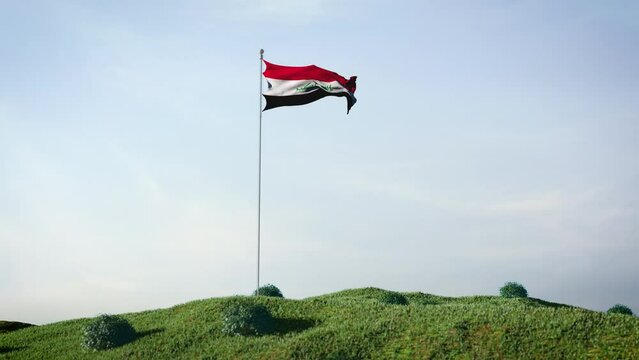 Iraq flag waving in the wind on a beautiful landscape. Blue sky. 4K HD. Stunning image.
