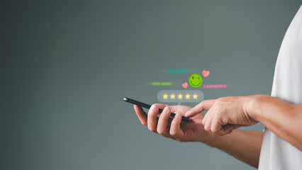 Customer service and Satisfaction ,Business people giving Feedback via the Internet from smart phone. Positive Review. Client Satisfaction Surveys, good, best product and service.