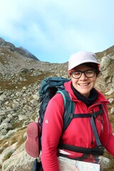 Fototapeta premium Pyrenees, Carros de Foc hiking tour. A week long hike from hut to hut on a natural scenery with lakes, mountains and amazing flora and fauna. 