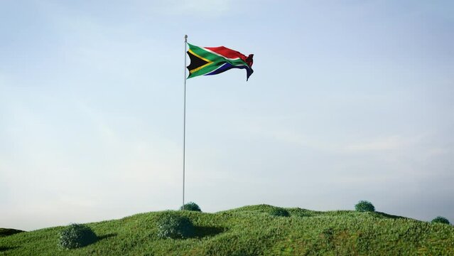 South Africa, South African flag waving in the wind on a beautiful landscape. Blue sky. 4K HD. Stunning image.