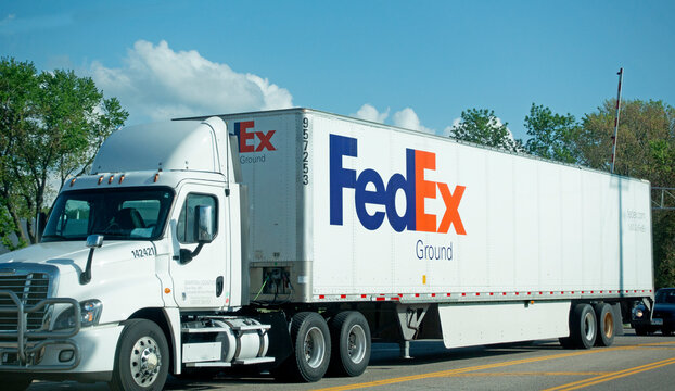 FedEx truck on the road making package deliveries. Shakopee Minnesota MN USA