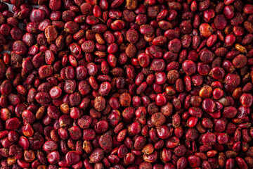 dry aromatic sumac spice on a white background