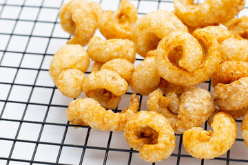 Crispy pork rinds or pork snack.