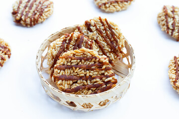 Rice cracker with coconut palm sugar on white