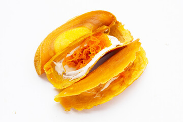 Thai crispy pancakes on white background.